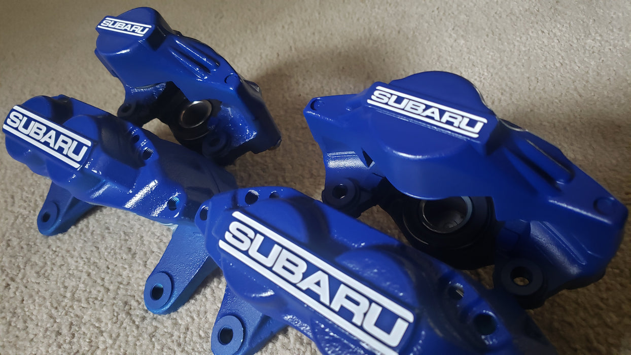 Flat Face set installed on WRX blue 4 pot calipers 26292FE0418A and 26292FE0518A